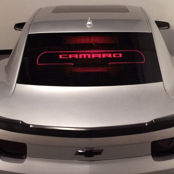 Red illuminated glow plate on Chevy Camaro- One of our best selling car accessories